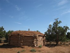 IMG_0228 The hogan is a sacred home for the Diné (Navajo) people who practice traditional religion. Every family -- even if they live most of the time in a newer home --...