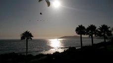 2015-08-31 17.42.30 A paraglider used the updraft to sail along the shoreline